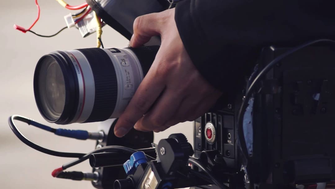 hand holding a camera